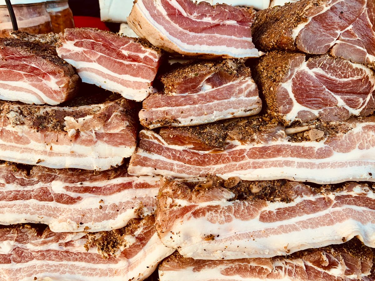 Stacked, seasoned pork belly ready for the kettle