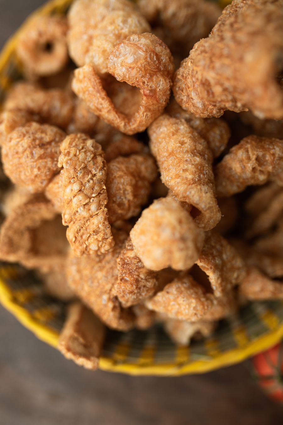 A bowl of Glenda's freshly fried pork cracklings