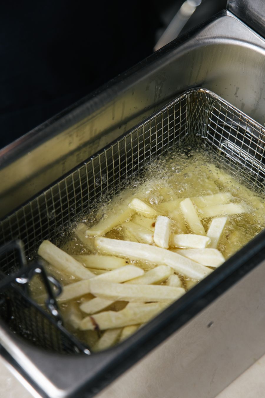 Fries frying in hot oil